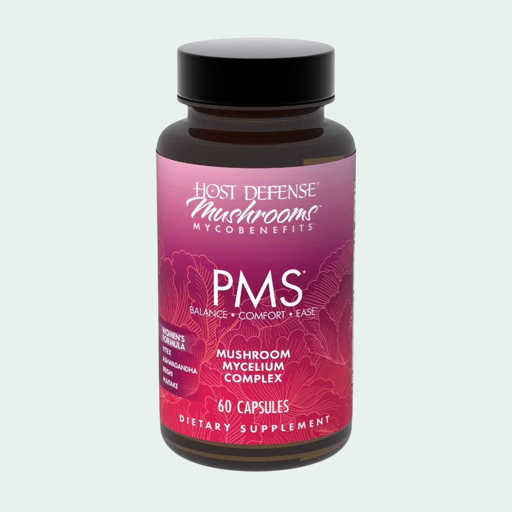 Supplement bottle labeled 'PMS' by Host Defense on a white background